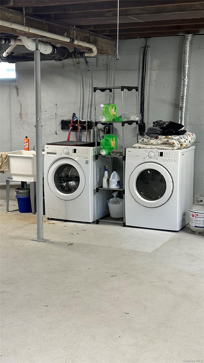 9 Hope Street Liberty, NY 12754 - Photo 20 of 24 a utility room with dryer and washer