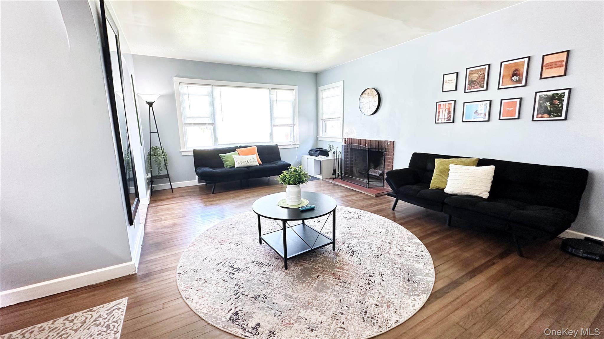 9 Hope Street Liberty, NY 12754 - Photo 2 of 24 a living room with furniture and a flat screen tv