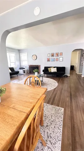a view of a living room and kitchen