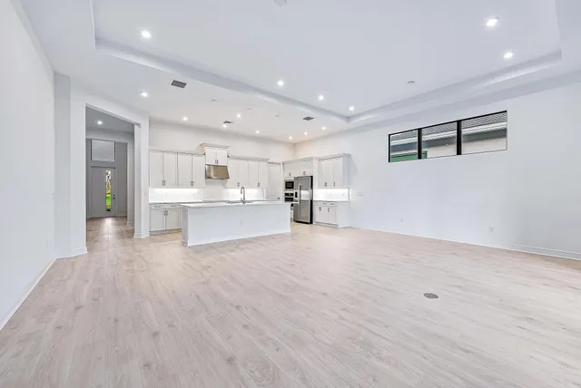 a view of kitchen with wooden floor