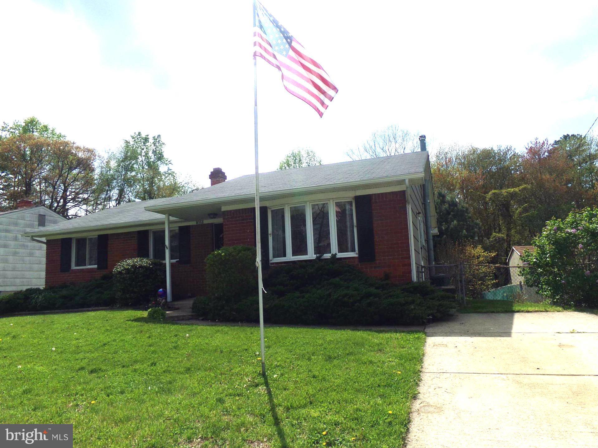 8113 Phirne Road East Glen Burnie, MD 21061 - Photo 2 of 27 a front view of house with yard and porch