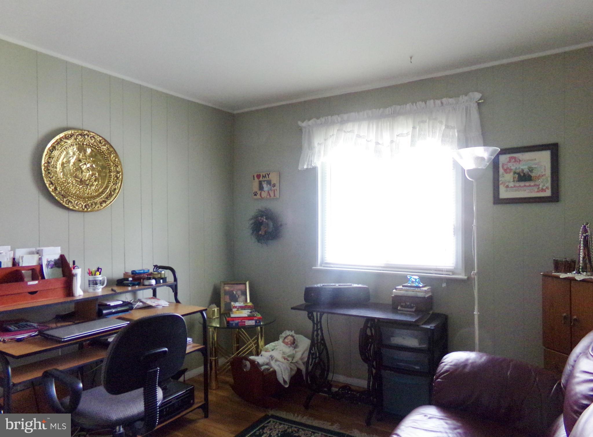 8113 Phirne Road East Glen Burnie, MD 21061 - Photo 13 of 27 a room with a workspace