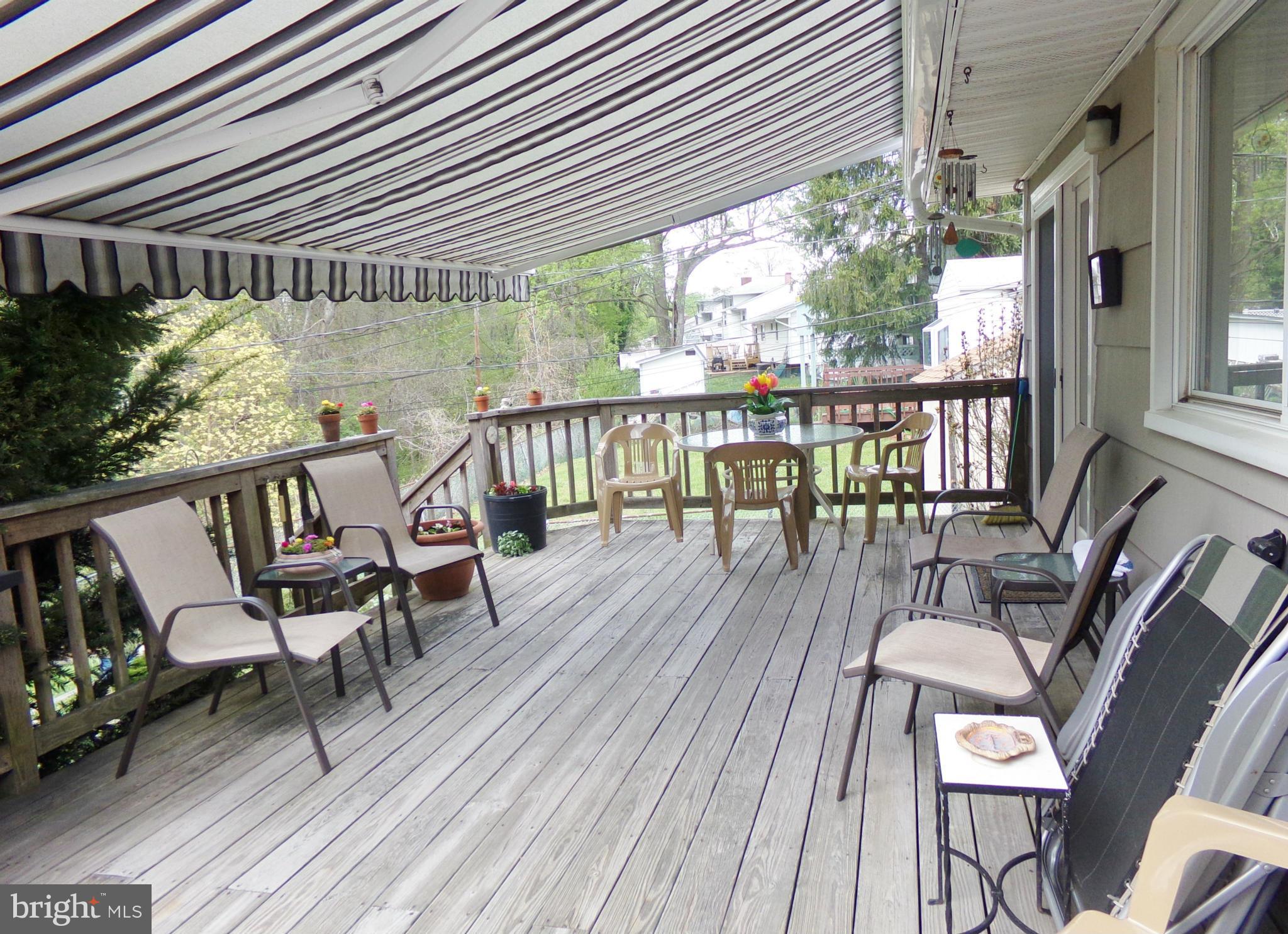 8113 Phirne Road East Glen Burnie, MD 21061 - Photo 4 of 27 a view of a balcony with chairs