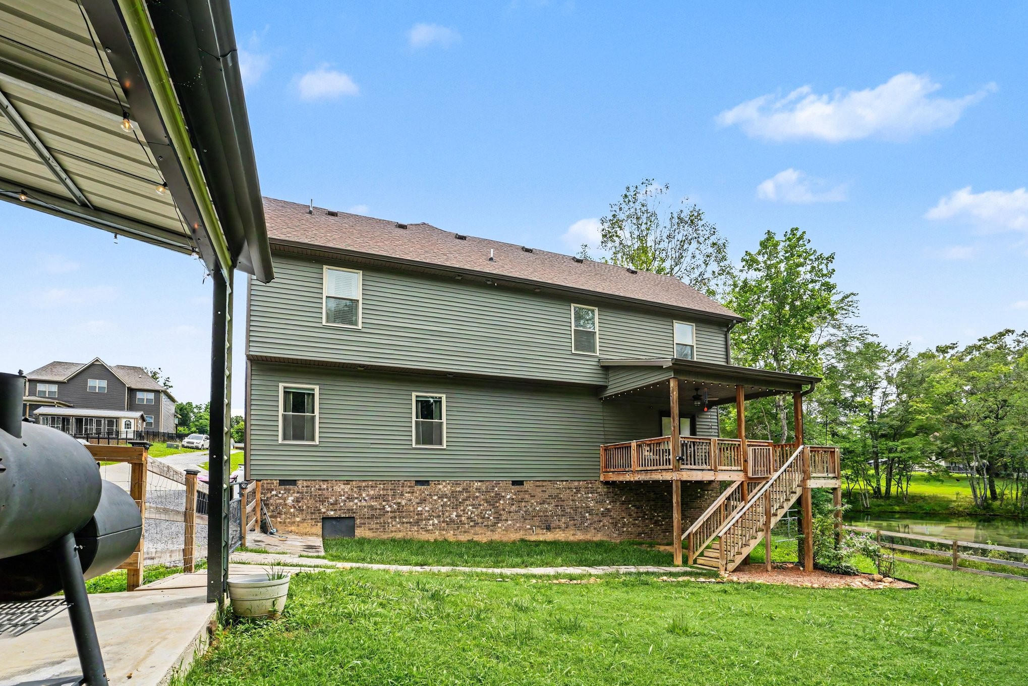 1415 Southside Road Southside, TN 37171 - Photo 25 of 35 front view of a house with a yard