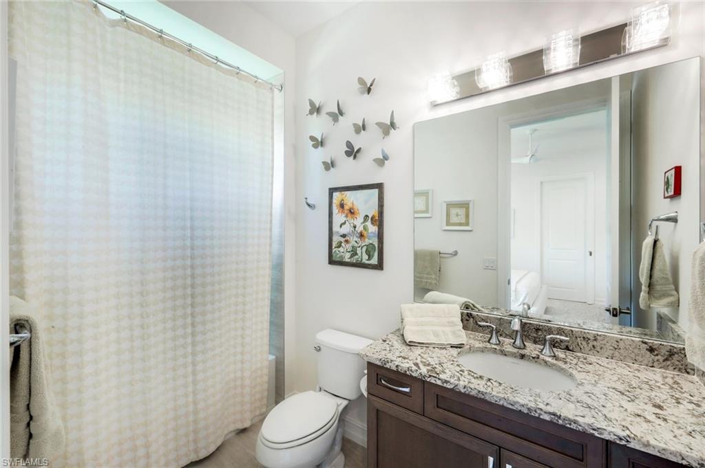 6259 Lightbourn Way Naples, FL 34113 - Photo 10 of 23 Guest bathroom with bathtub