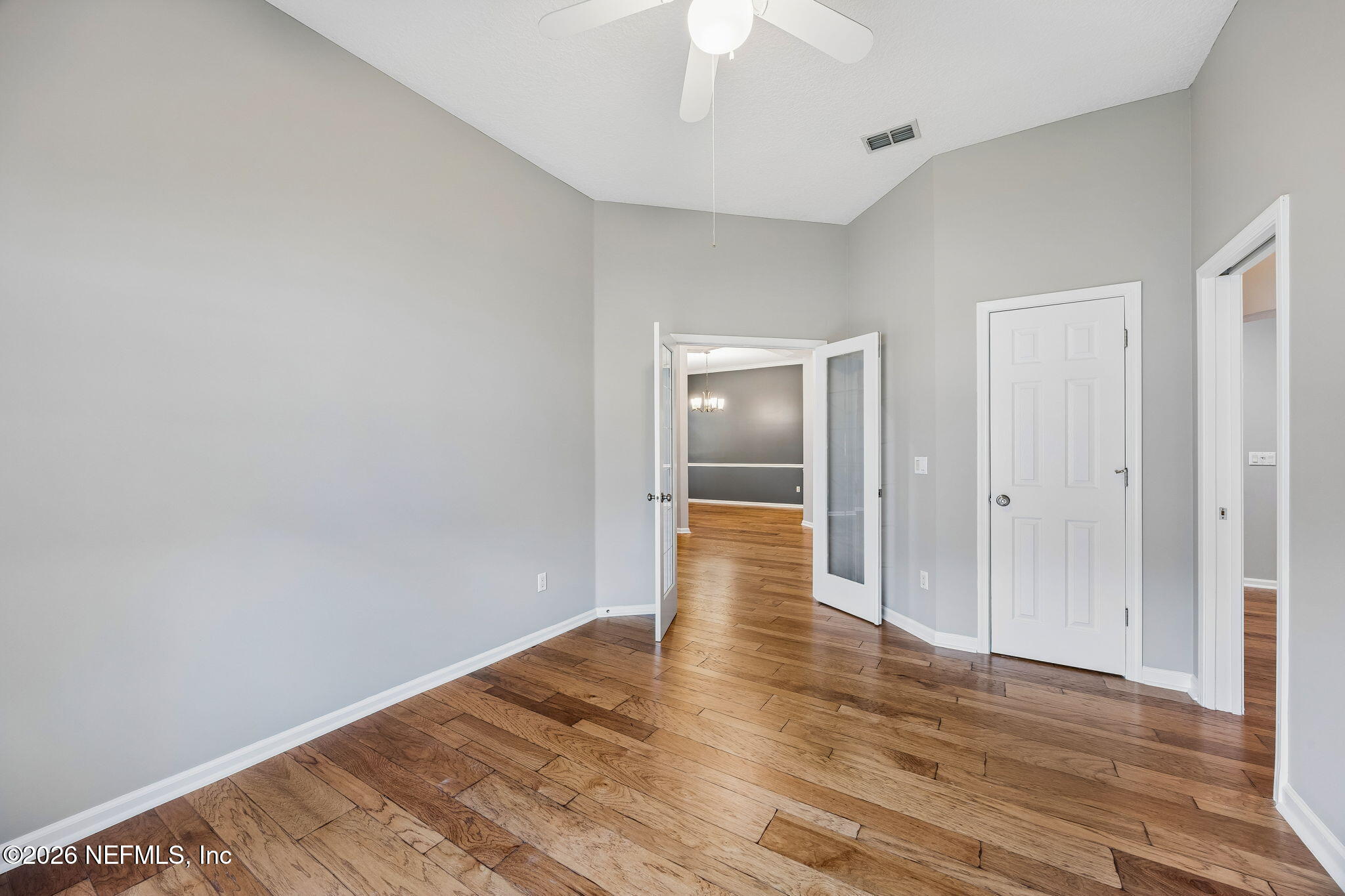 213 Springwood Lane St. Johns, FL 32259 - Photo 14 of 78 a view of an empty room with wooden floor
