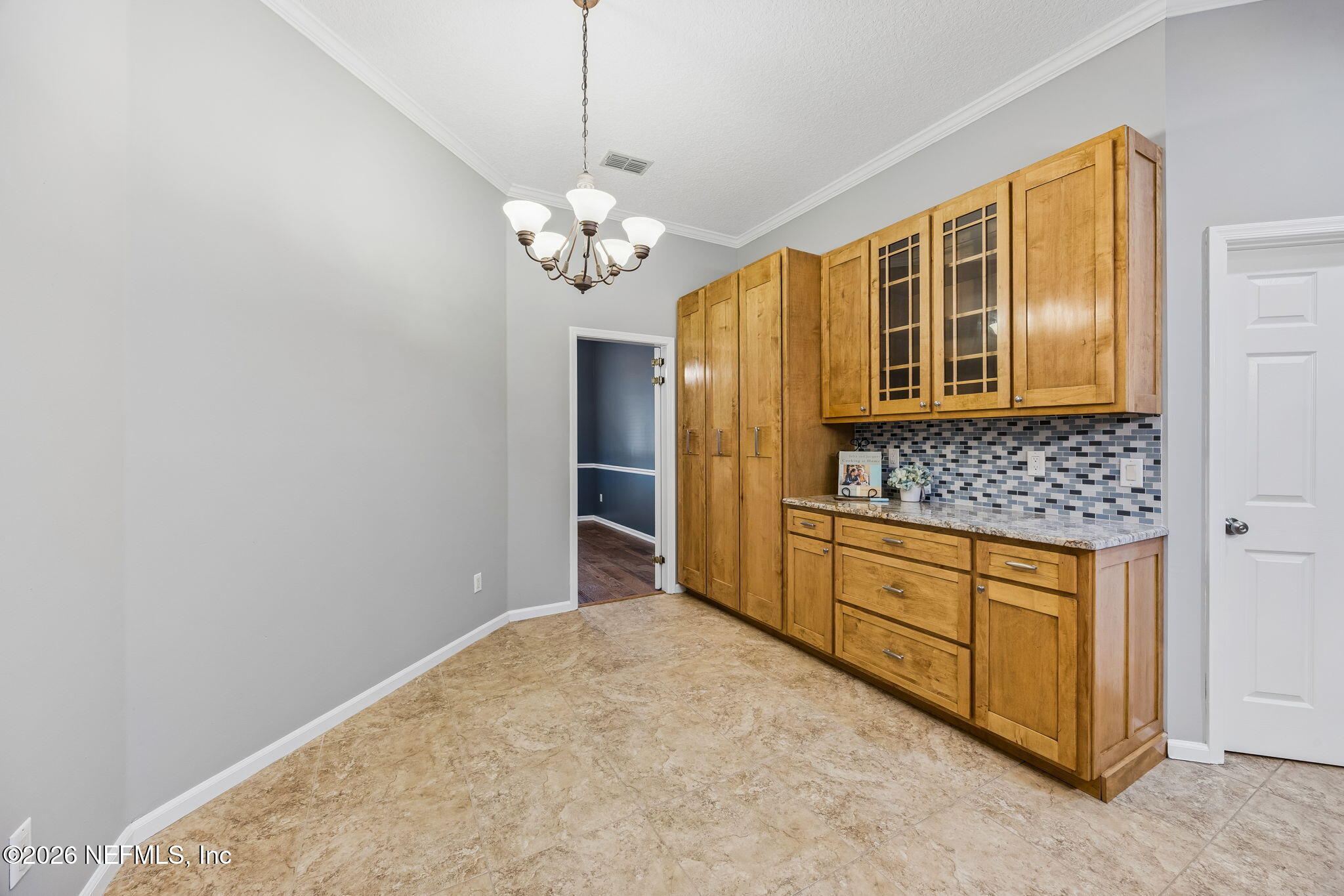 213 Springwood Lane St. Johns, FL 32259 - Photo 21 of 78 a spacious bathroom with a granite countertop sink and a mirror