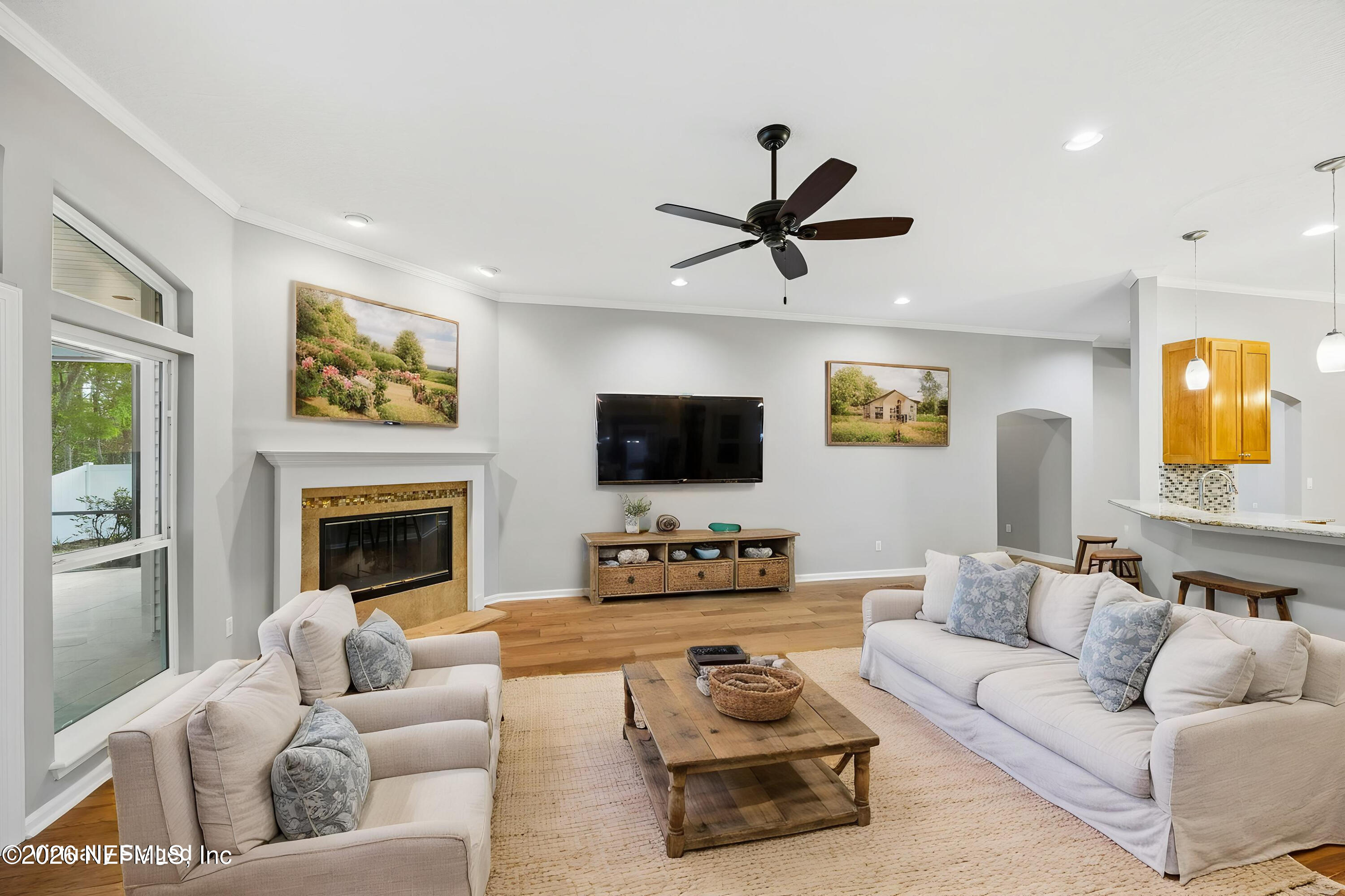 213 Springwood Lane St. Johns, FL 32259 - Photo 27 of 78 a living room with furniture and a fireplace