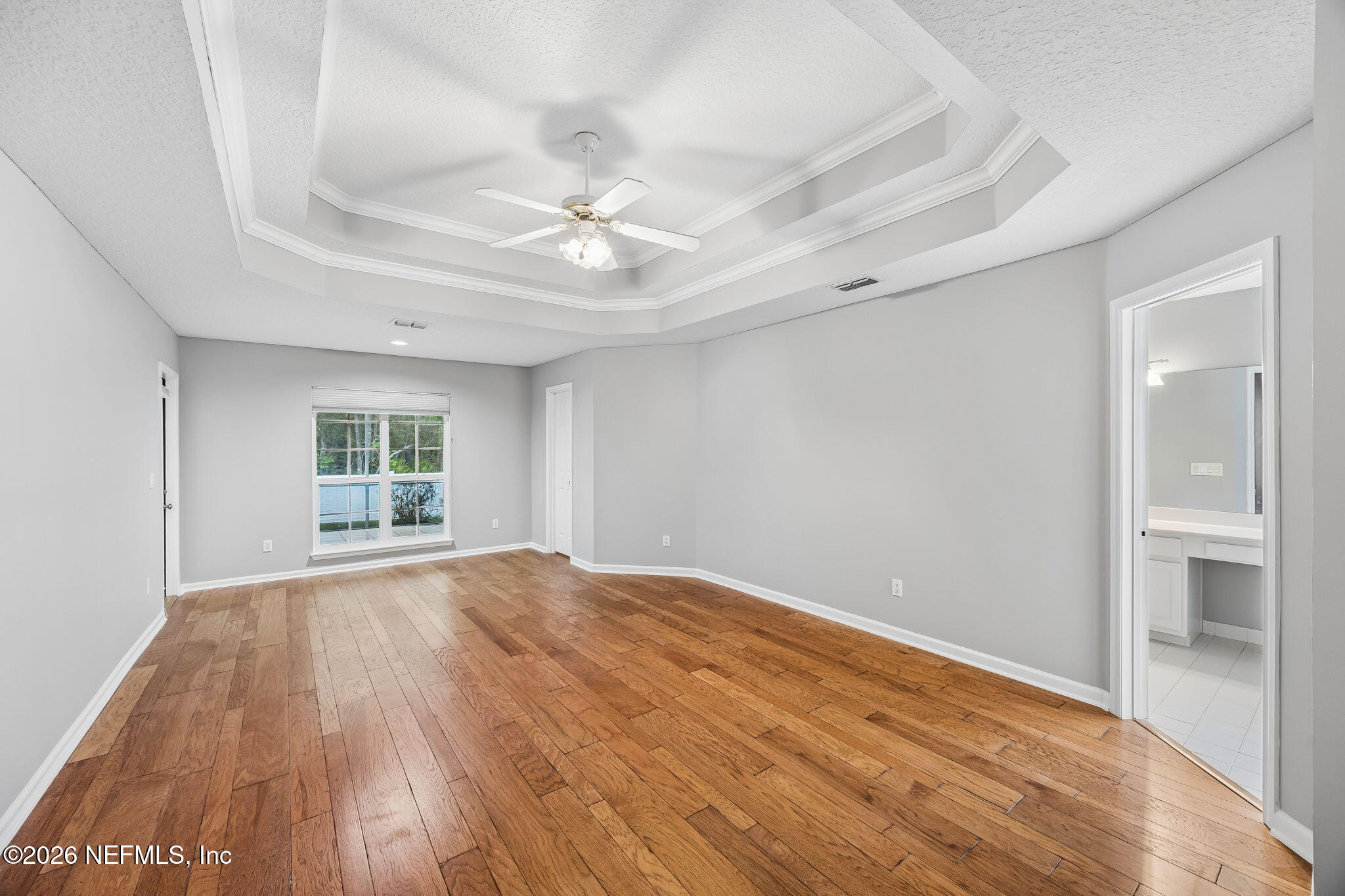 213 Springwood Lane St. Johns, FL 32259 - Photo 29 of 78 wooden floor in an empty room with a window