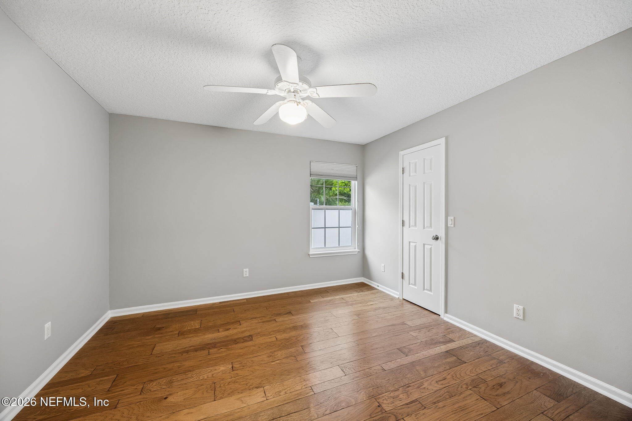 213 Springwood Lane St. Johns, FL 32259 - Photo 35 of 78 wooden floor in an empty room with a window