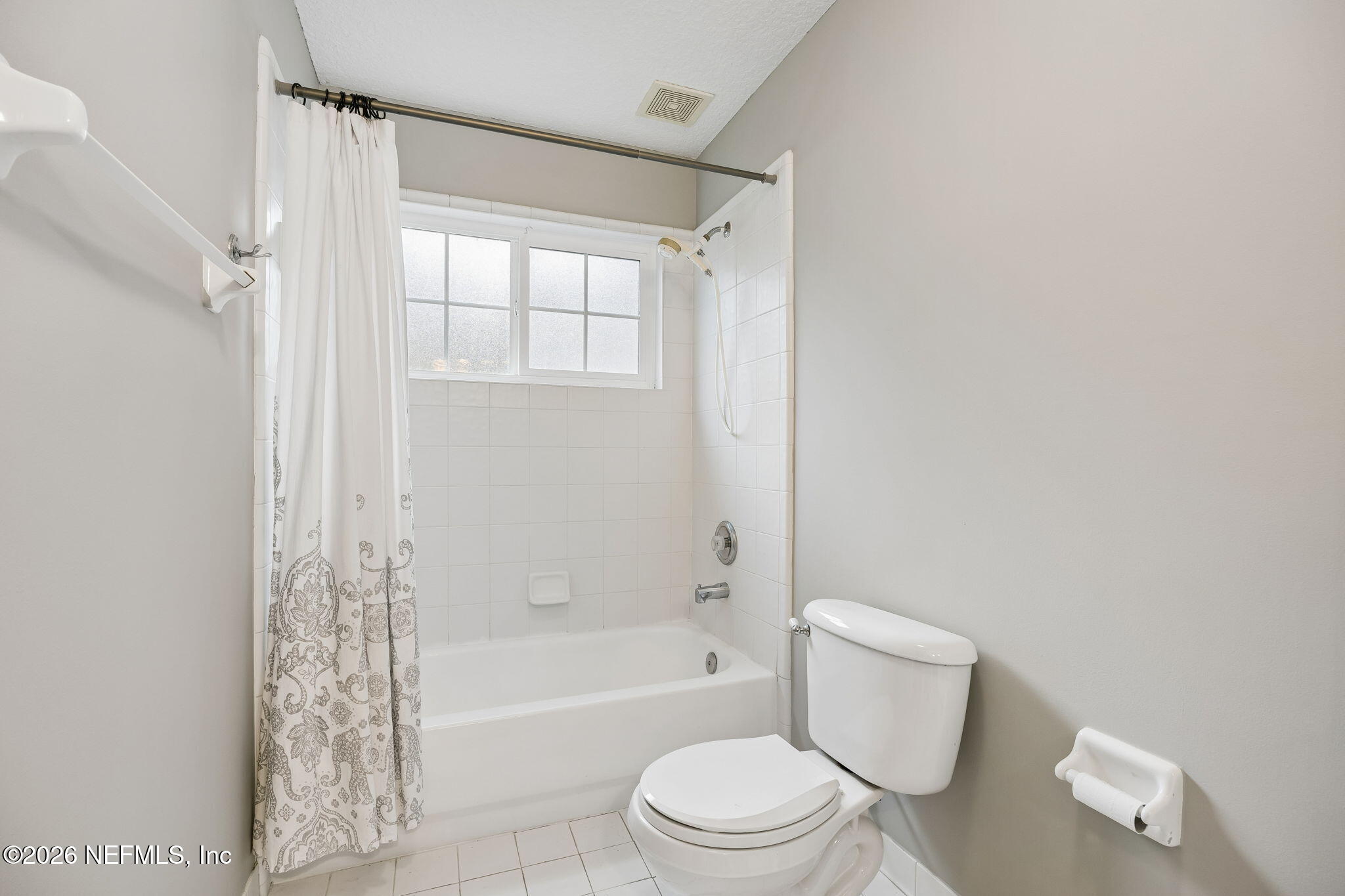 213 Springwood Lane St. Johns, FL 32259 - Photo 42 of 78 a white toilet sitting next to a bath tub