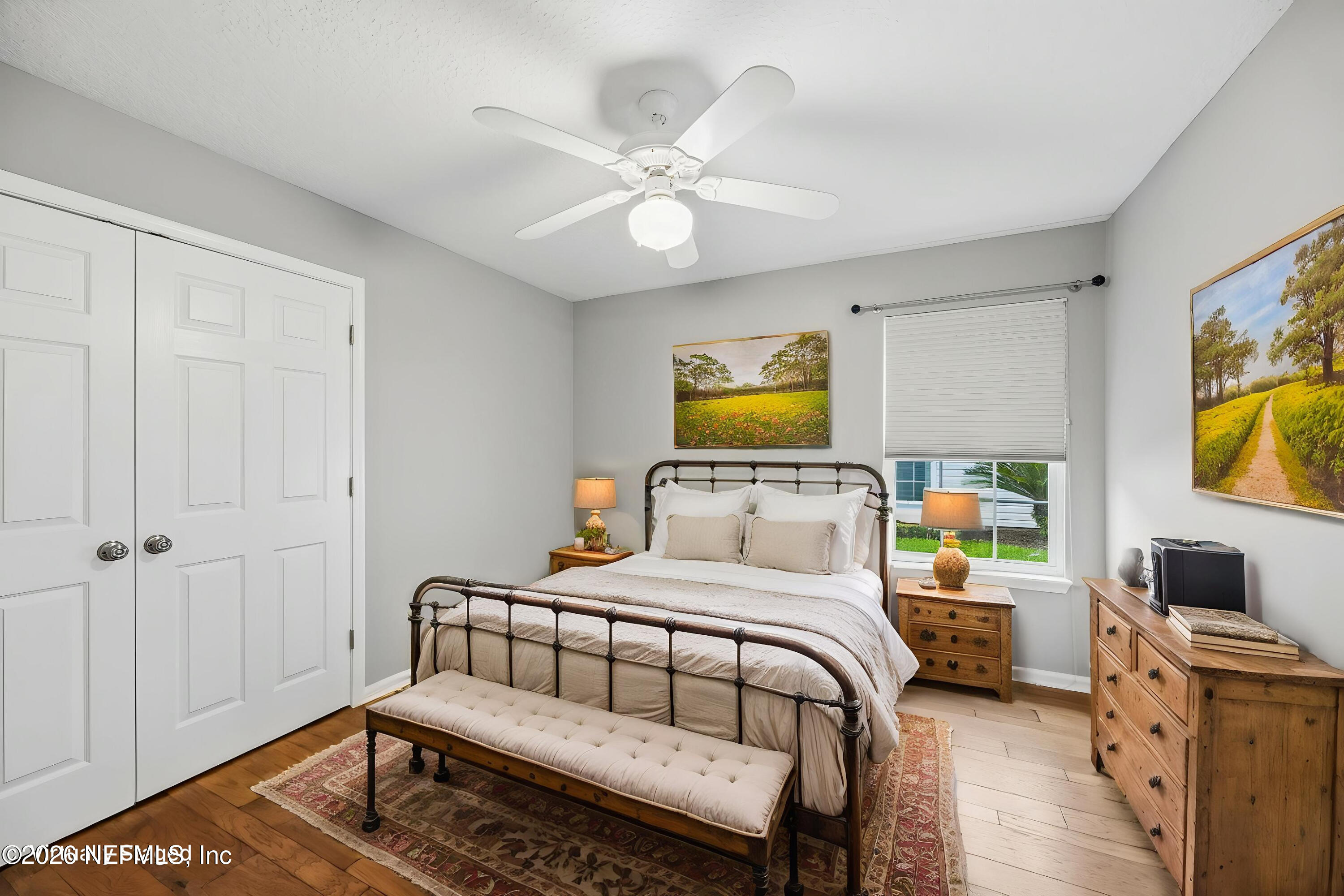 213 Springwood Lane St. Johns, FL 32259 - Photo 45 of 78 a bedroom with a bed and a chandelier