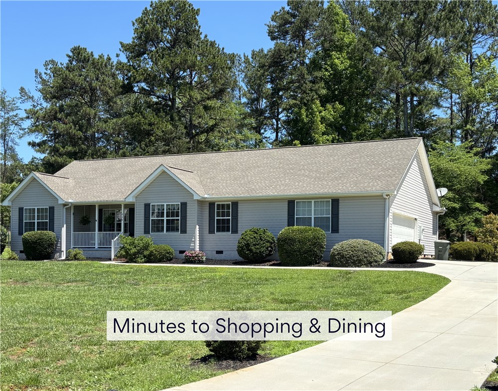 848 Perkins Creek Road Seneca, SC 29678 - Photo 26 of 26 A well-maintained facade offers a welcoming entry with neatly manicured landscaping.