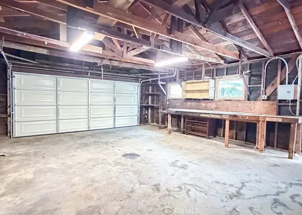 a view of a room with furniture