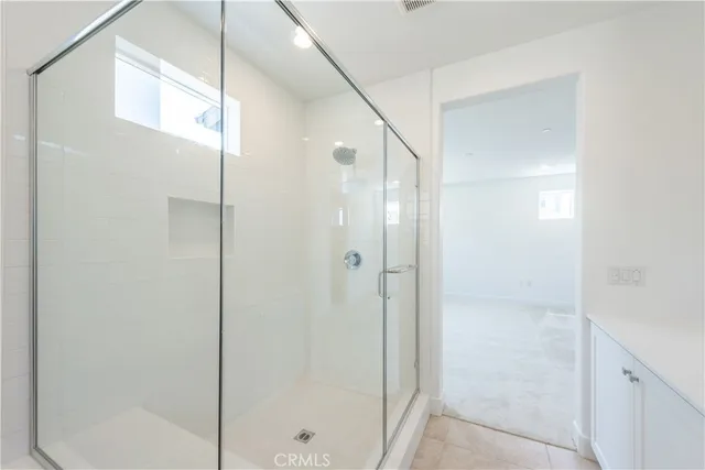 a view of an empty walk in closet