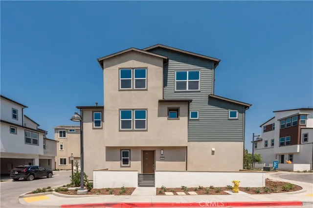 a front view of a house with street