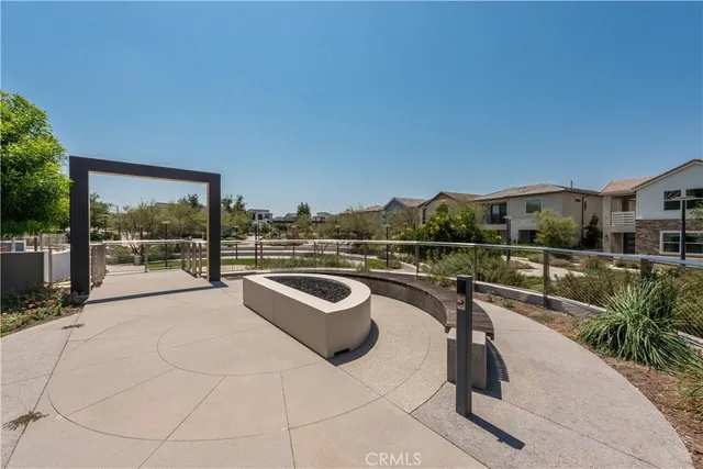 a view of a garden with a fountain