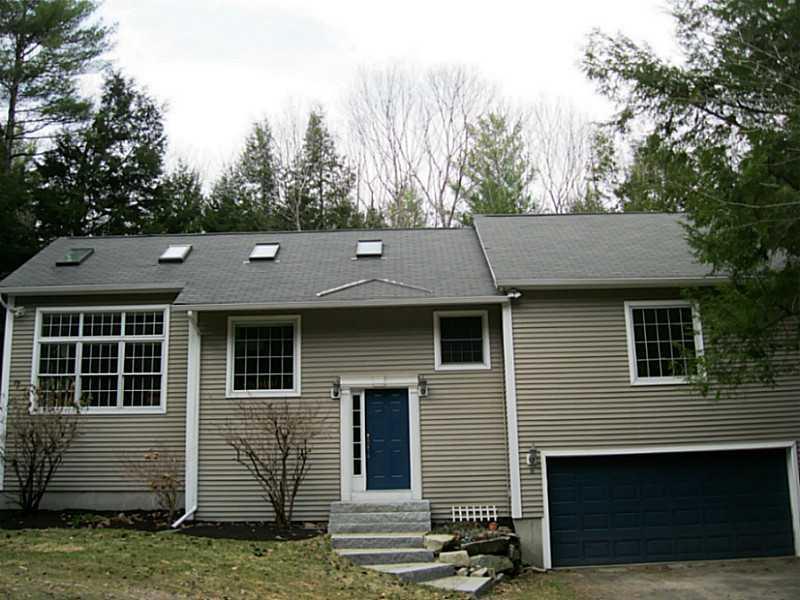 8 Sherbrook Lane Windham, ME 04062 - Photo 3 of 27 Exterior Front. Lots of windows and...