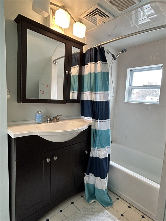 32 Parker Street, Unit 1 Lexington, MA 02421 - Photo 17 of 20 a bathroom with a sink and a mirror