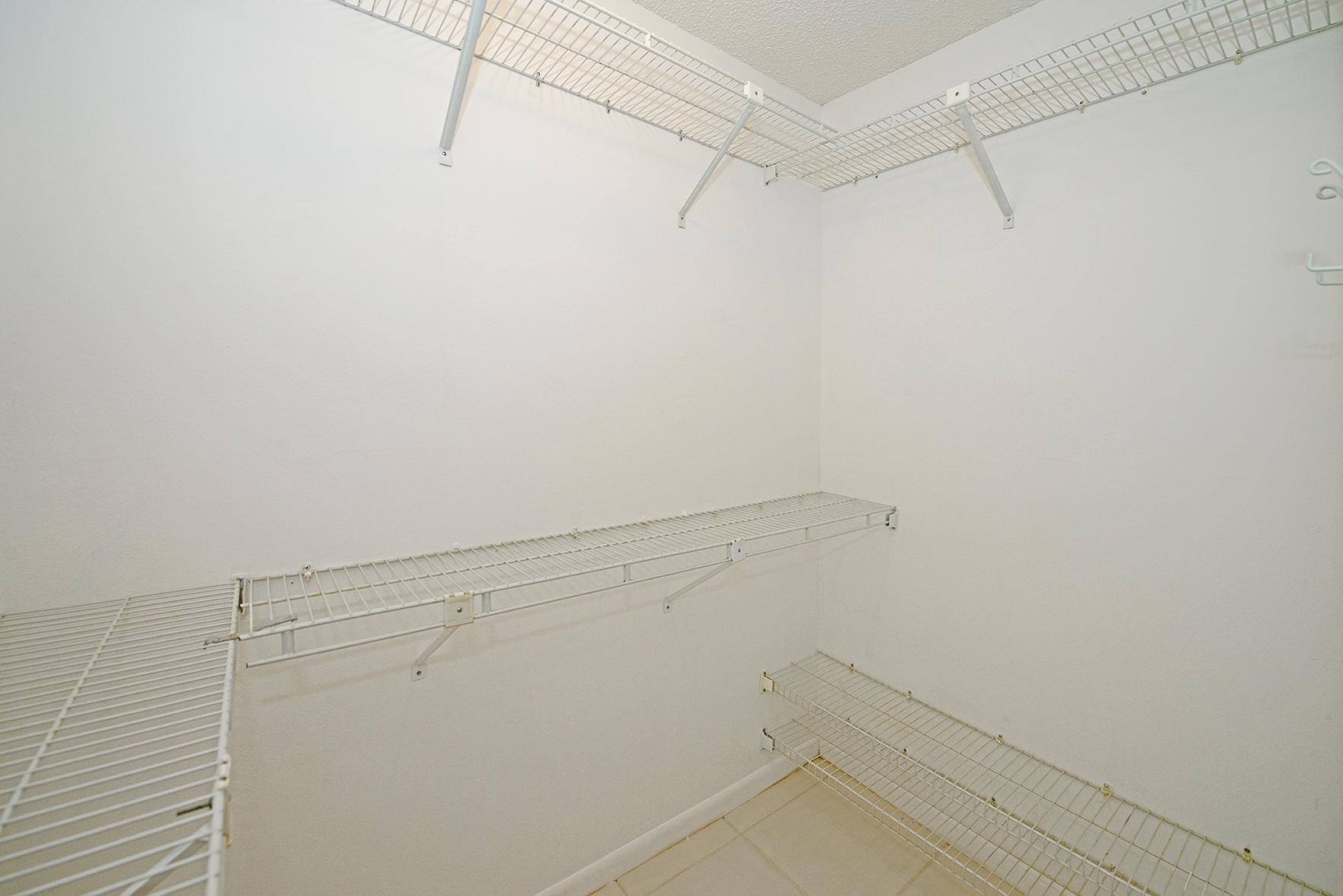 21755 Arriba Real, Unit 29E Boca Raton, FL 33433 - Photo 13 of 33 Master Bedroom Walk-in Closet