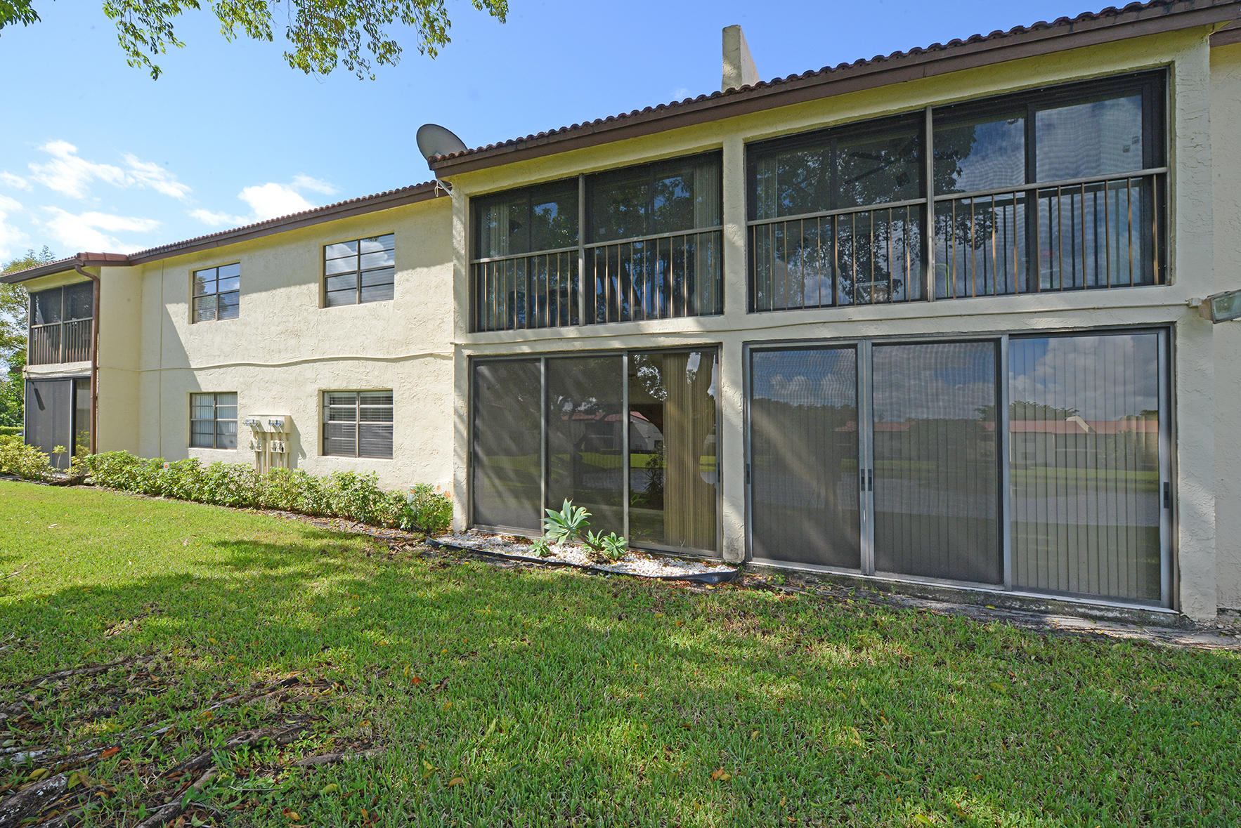 21755 Arriba Real, Unit 29E Boca Raton, FL 33433 - Photo 20 of 33 Back Patio Area