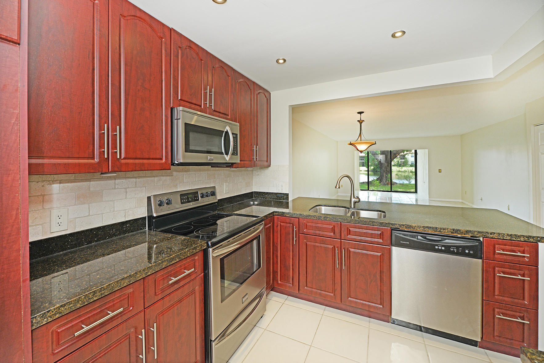 21755 Arriba Real, Unit 29E Boca Raton, FL 33433 - Photo 2 of 33 Open Kitchen