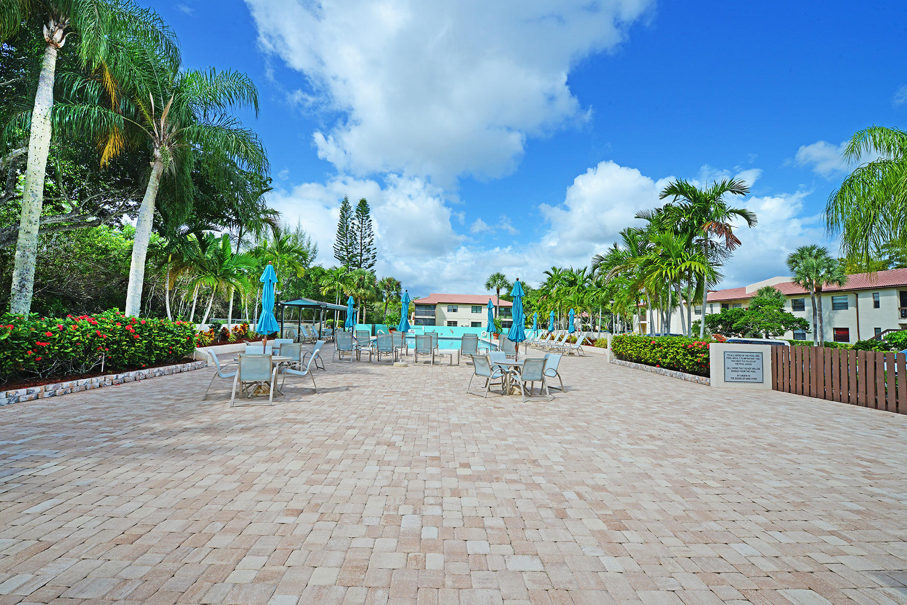 21755 Arriba Real, Unit 29E Boca Raton, FL 33433 - Photo 26 of 33 Community Patio Area