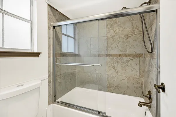 a view of a room with a window