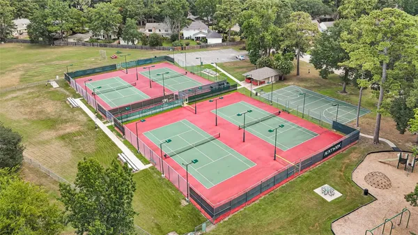 a view of living room with furniture and fireplace