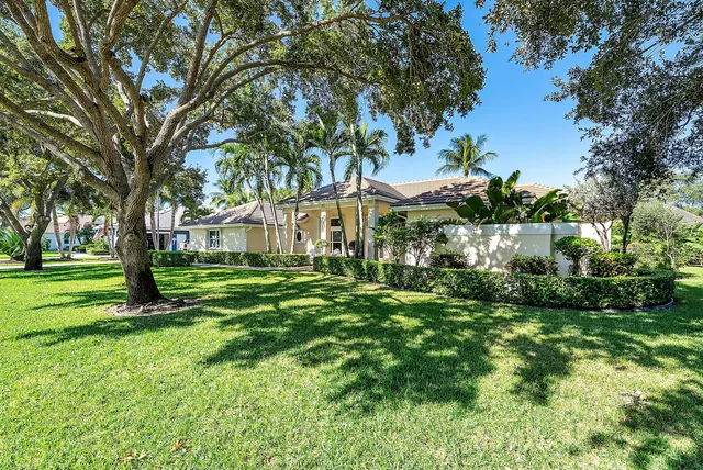 a view of a house with a big yard