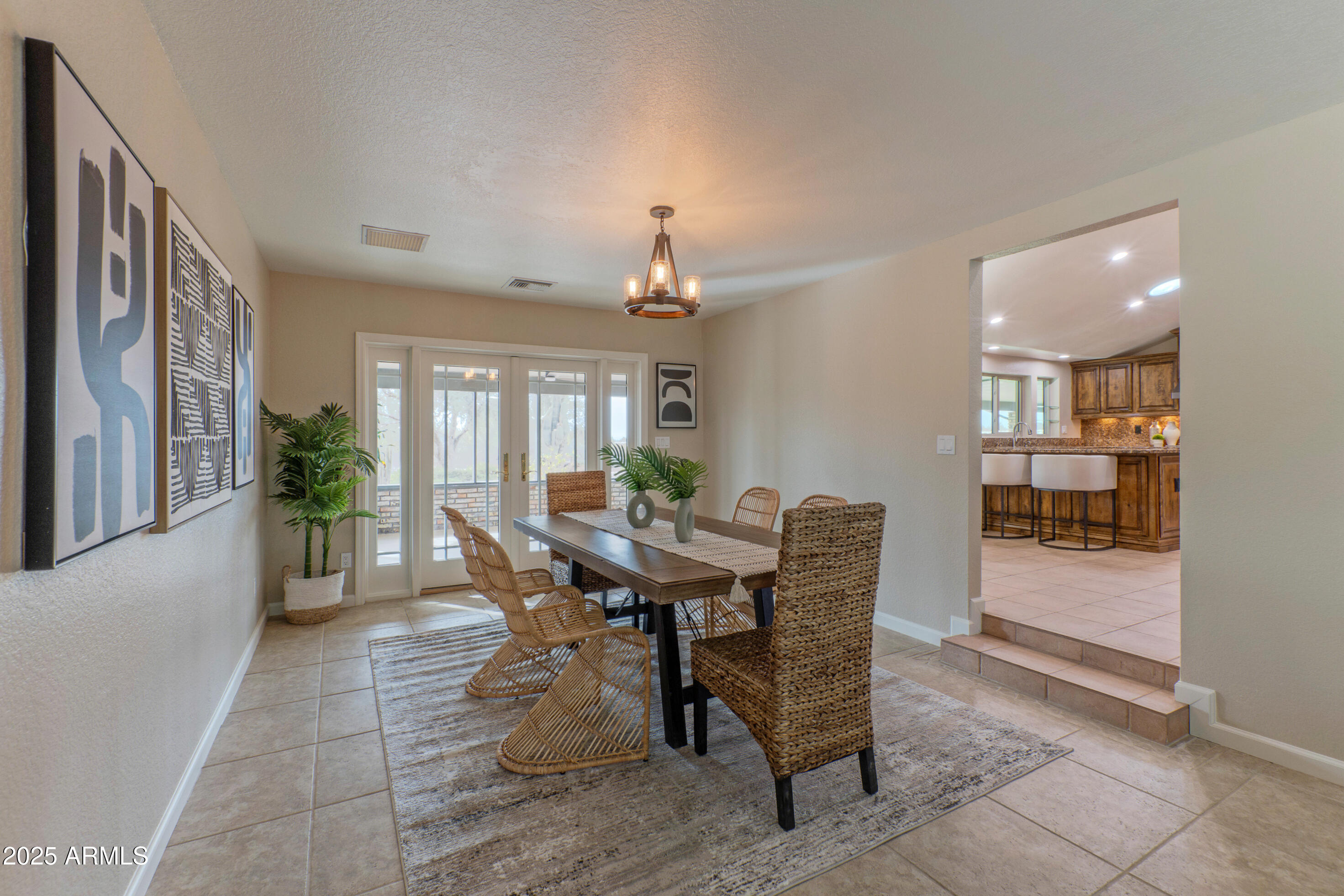 5911 East Peak View Road Cave Creek, AZ 85331 - Photo 15 of 63 a view of a dining room with furniture