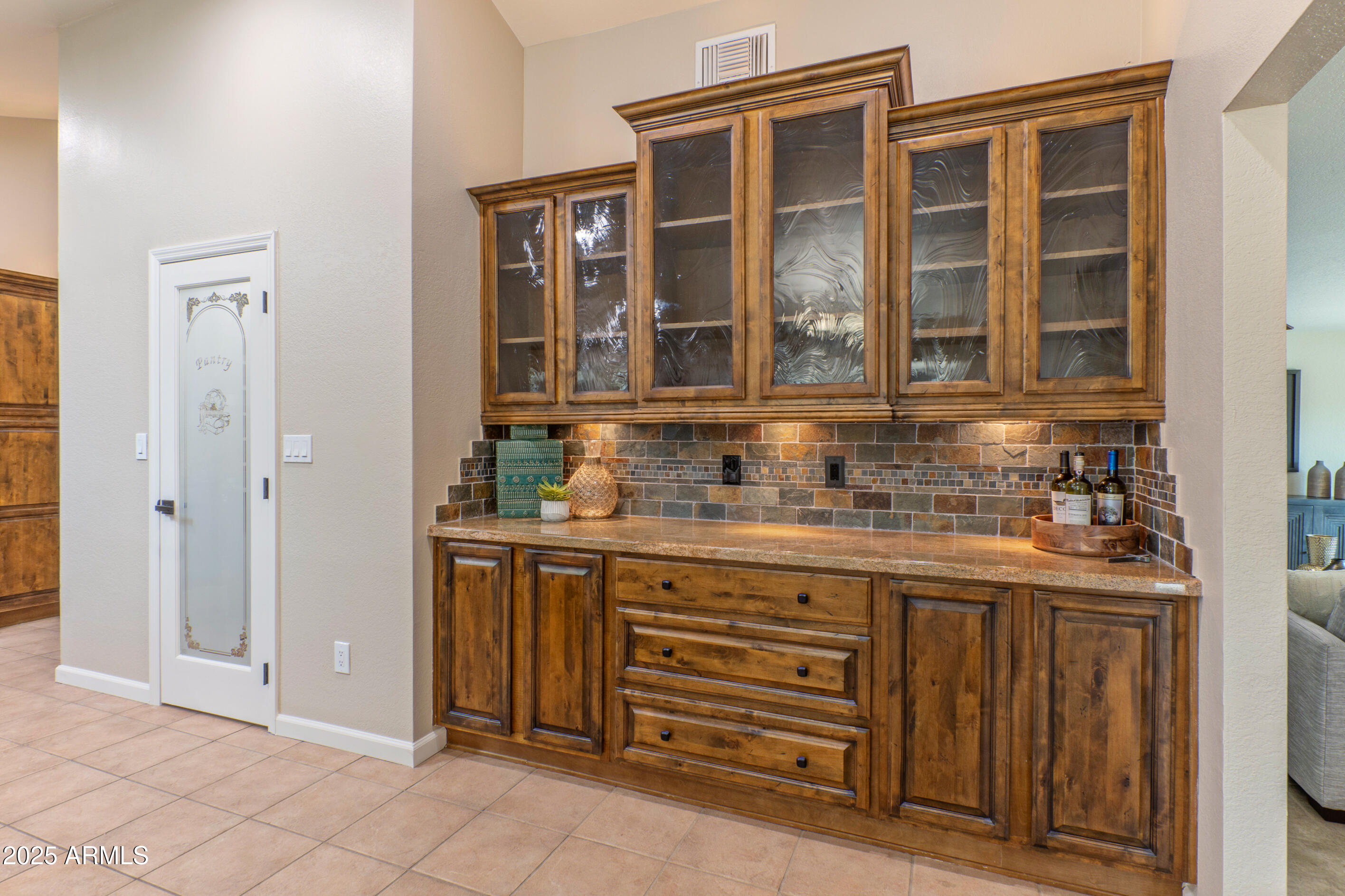 5911 East Peak View Road Cave Creek, AZ 85331 - Photo 20 of 63 a kitchen with a sink and a cabinets