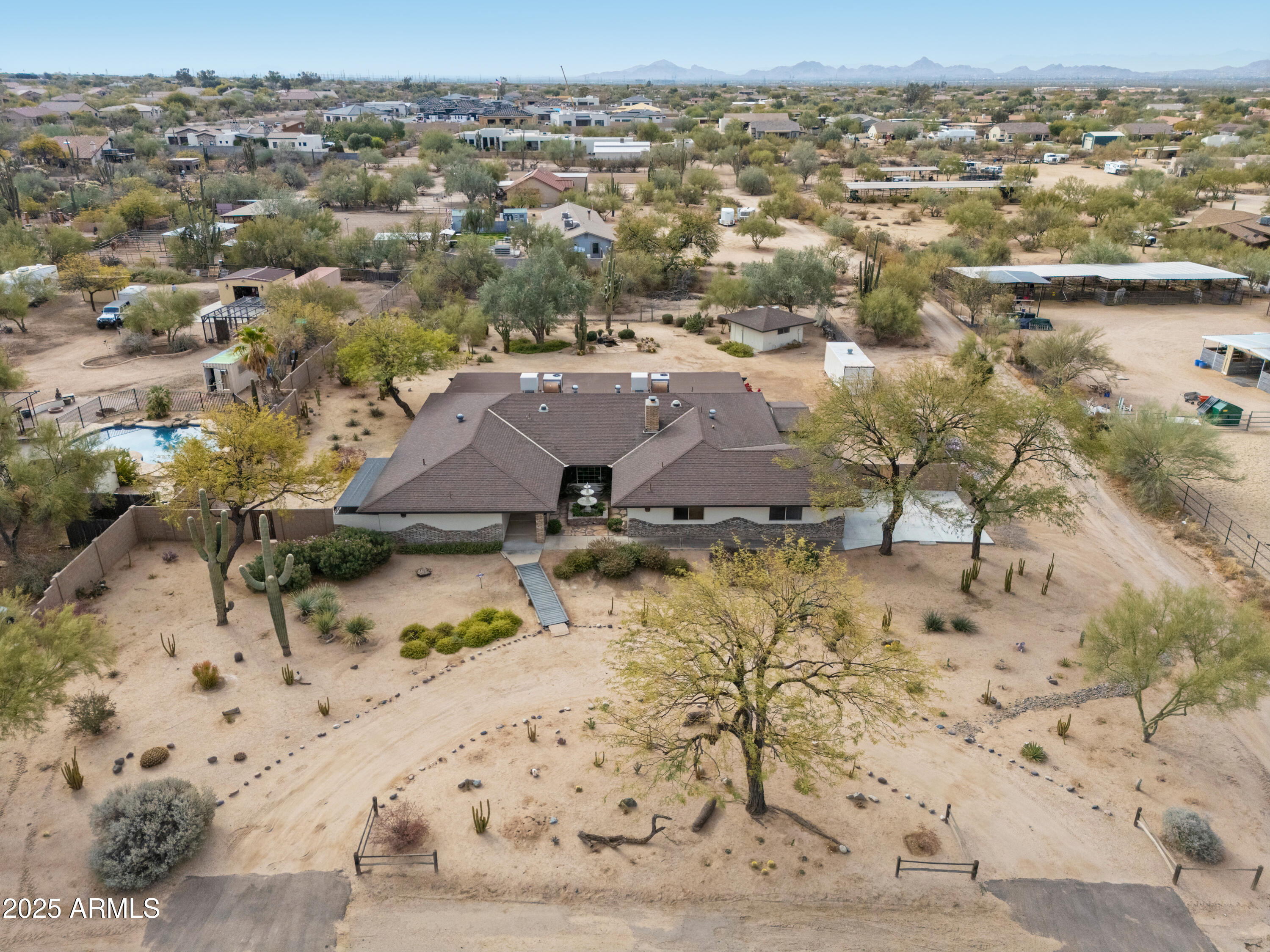 5911 East Peak View Road Cave Creek, AZ 85331 - Photo 2 of 63 an aerial view of residential houses with outdoor space