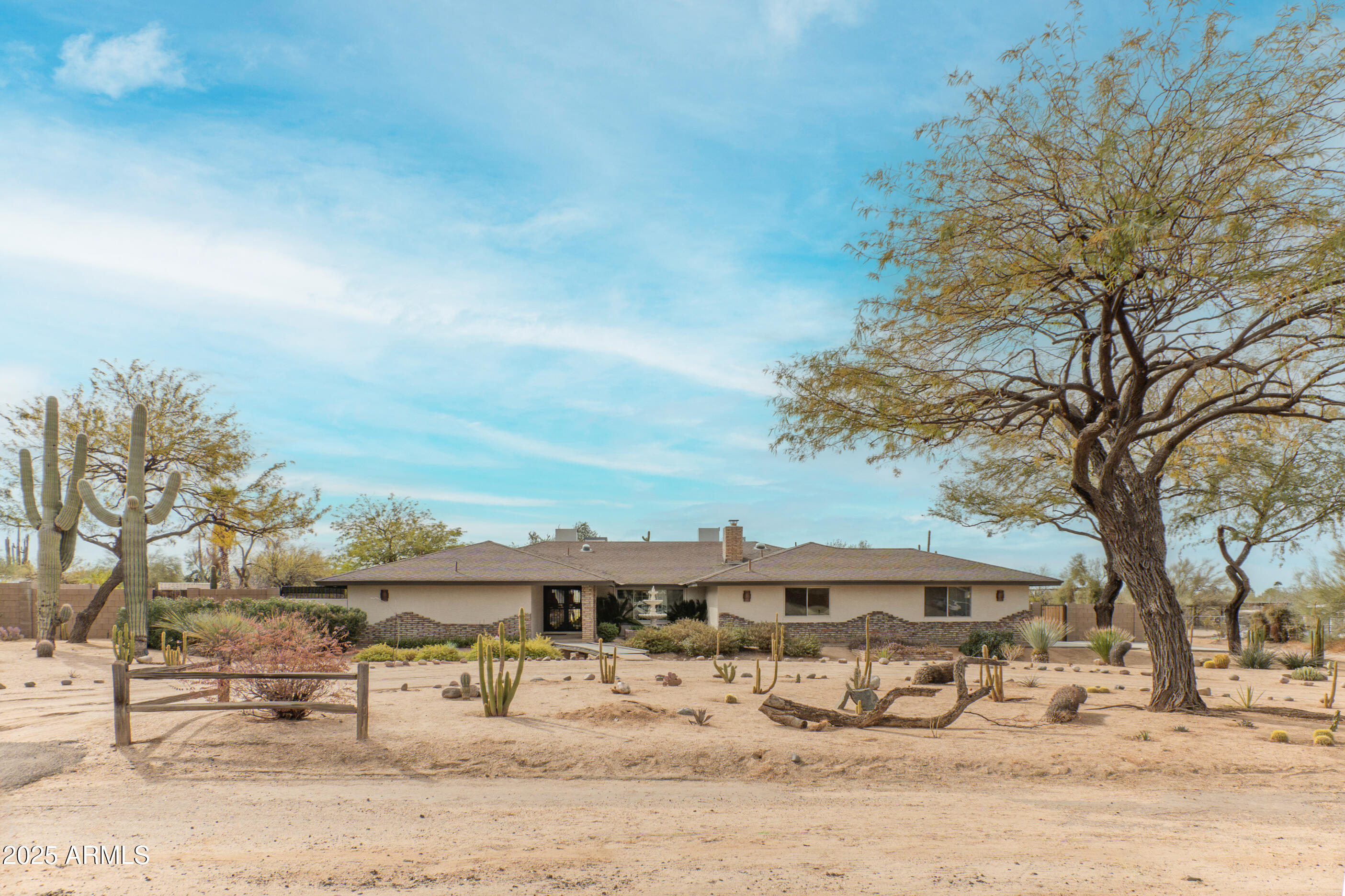 5911 East Peak View Road Cave Creek, AZ 85331 - Photo 3 of 63 a view of a terrace with trees