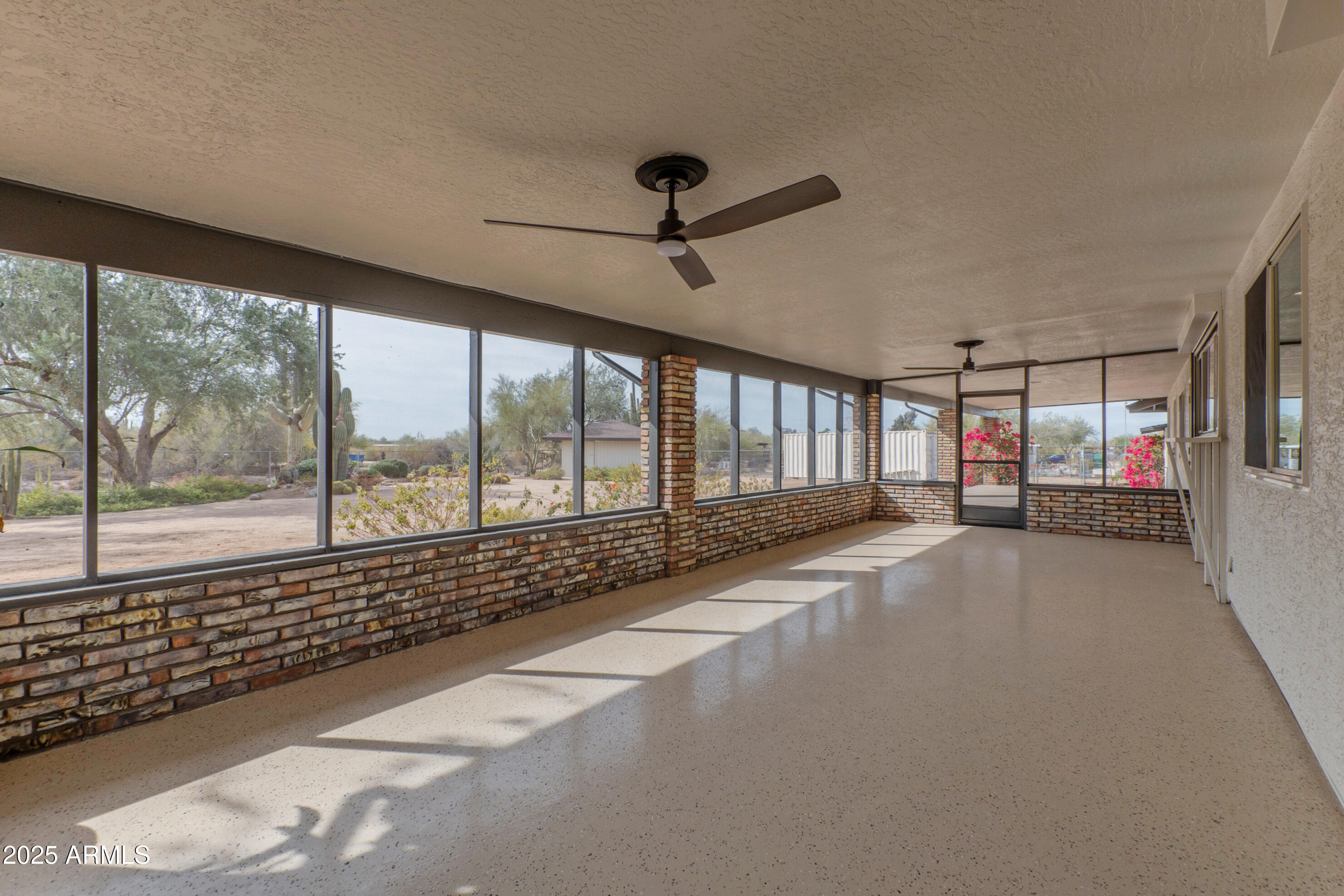 5911 East Peak View Road Cave Creek, AZ 85331 - Photo 38 of 63 Screened patio is huge
