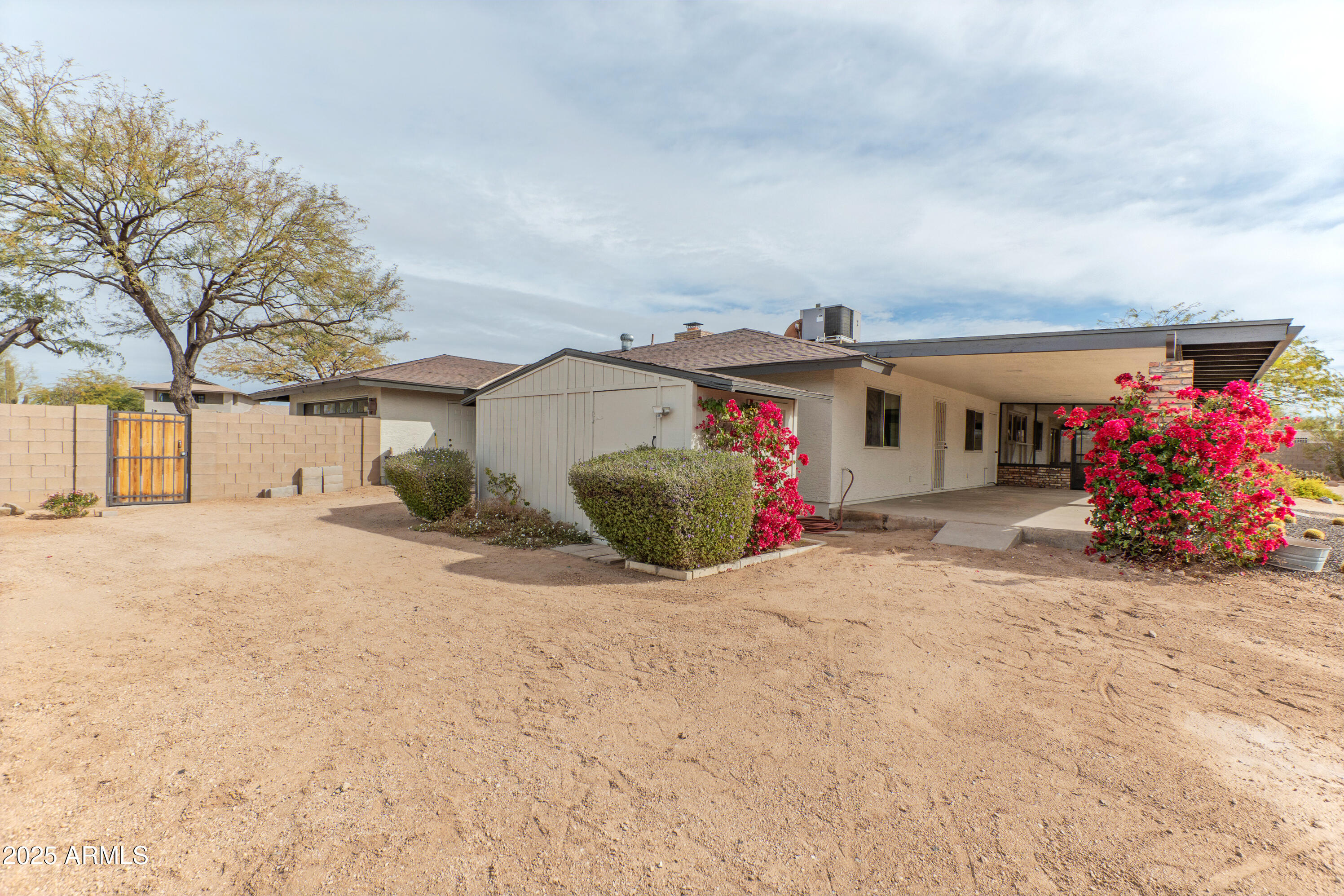 5911 East Peak View Road Cave Creek, AZ 85331 - Photo 44 of 63 a view of a house with a outdoor space