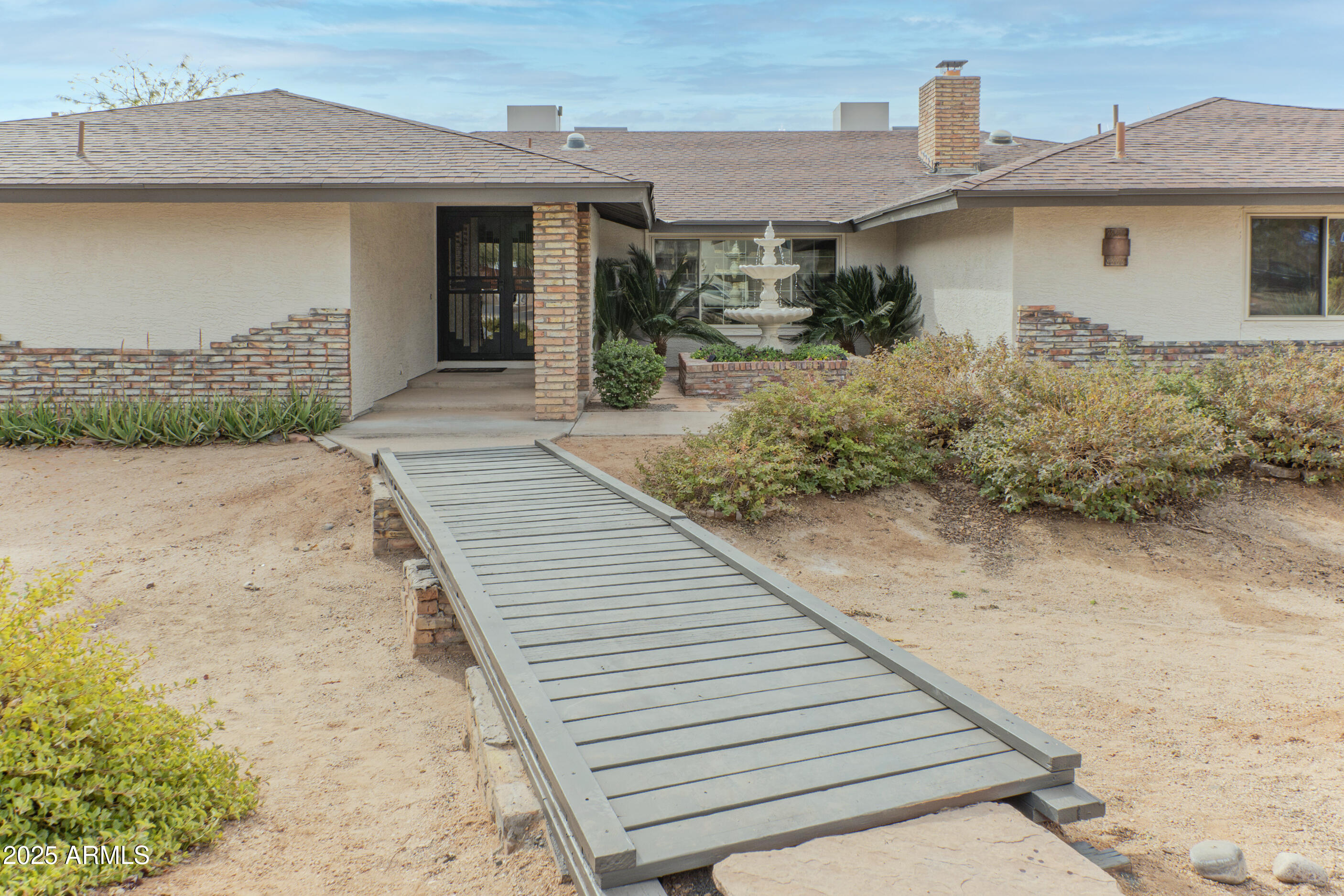 5911 East Peak View Road Cave Creek, AZ 85331 - Photo 5 of 63 a front view of a house