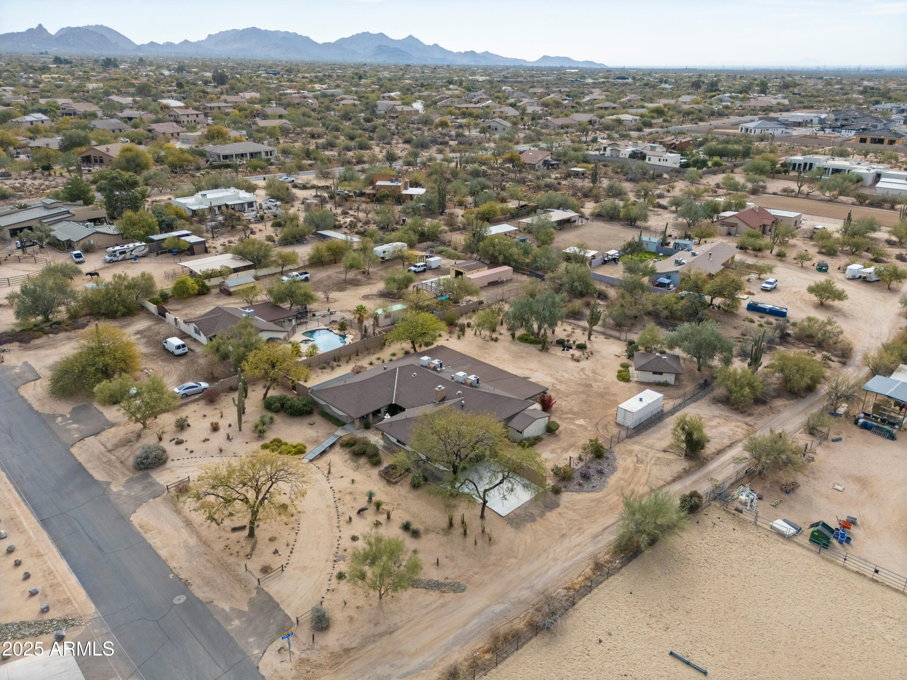 5911 East Peak View Road Cave Creek, AZ 85331 - Photo 60 of 63 an aerial view of residential house and outdoor space