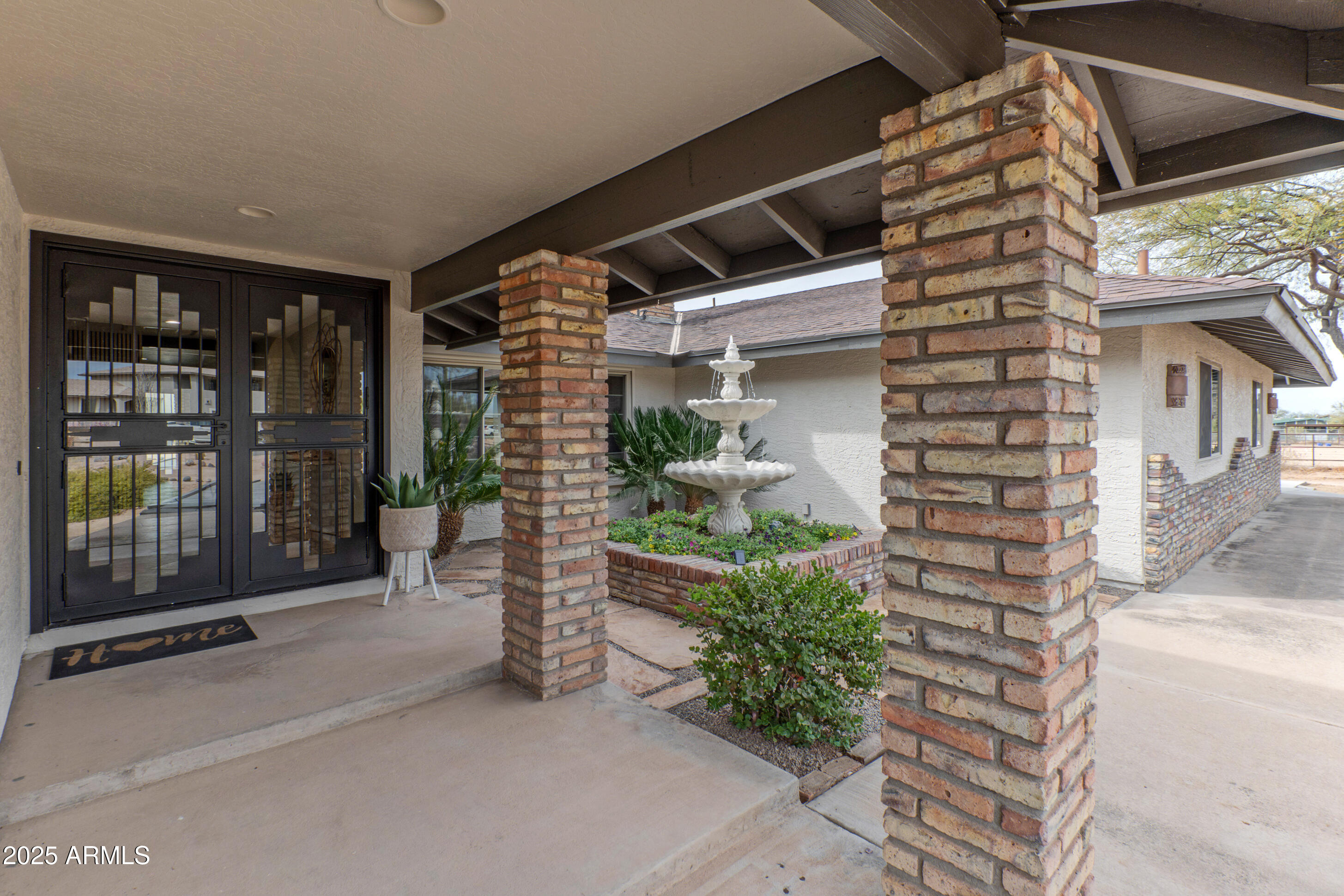 5911 East Peak View Road Cave Creek, AZ 85331 - Photo 6 of 63 a view of front door and porch