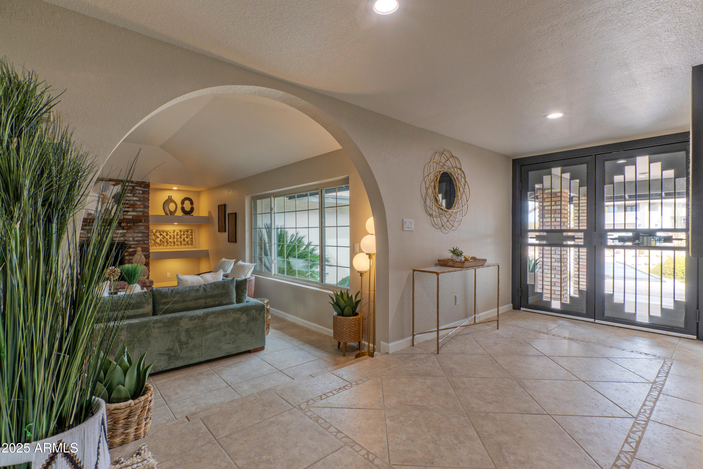 5911 East Peak View Road Cave Creek, AZ 85331 - Photo 9 of 63 a living room with furniture and a floor to ceiling window