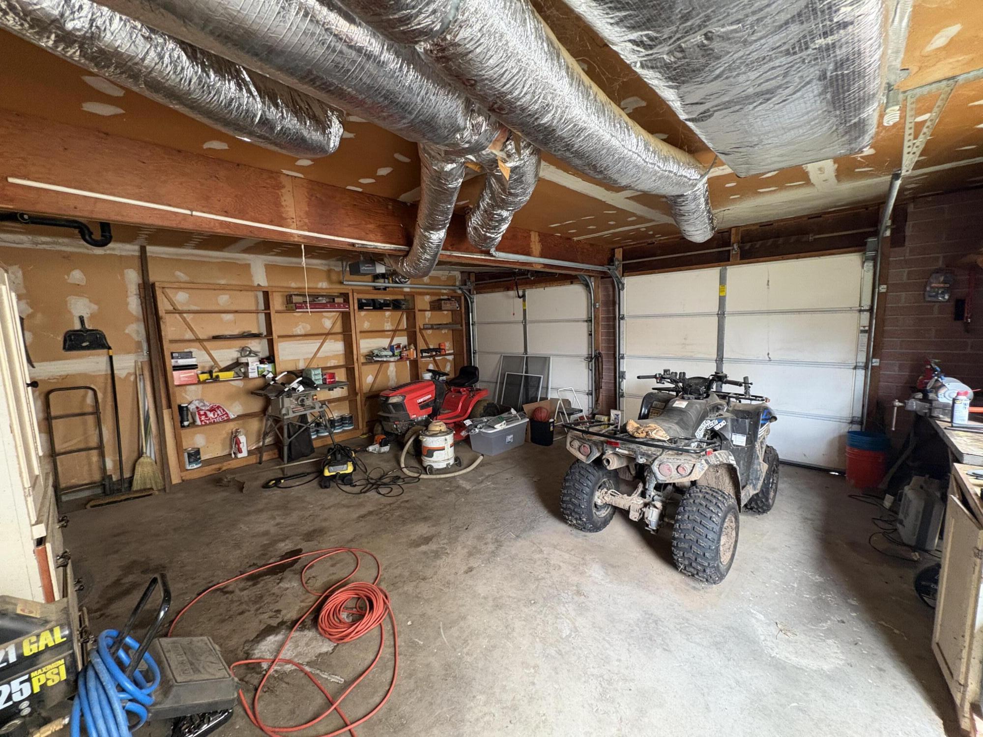 41139 Brown Road Fall River Mills, CA 96028 - Photo 20 of 29 a view of a storage room with a lot of stuff