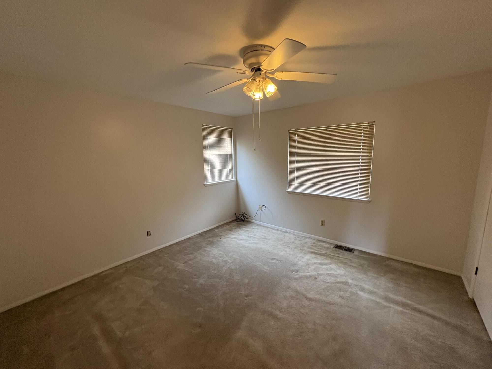 41139 Brown Road Fall River Mills, CA 96028 - Photo 28 of 29 an empty room with a window and a fan