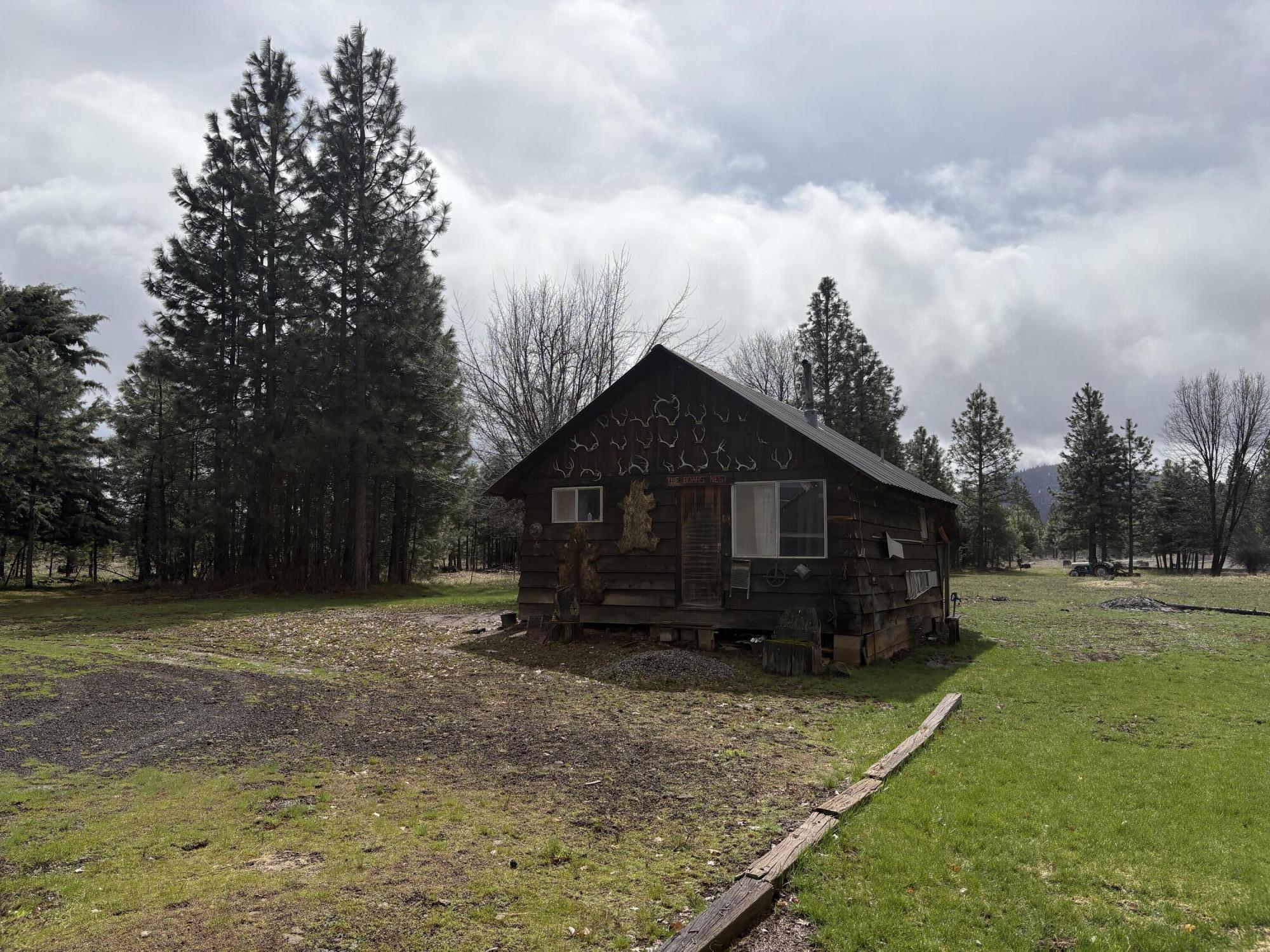 41139 Brown Road Fall River Mills, CA 96028 - Photo 5 of 29 a view of a house with a yard