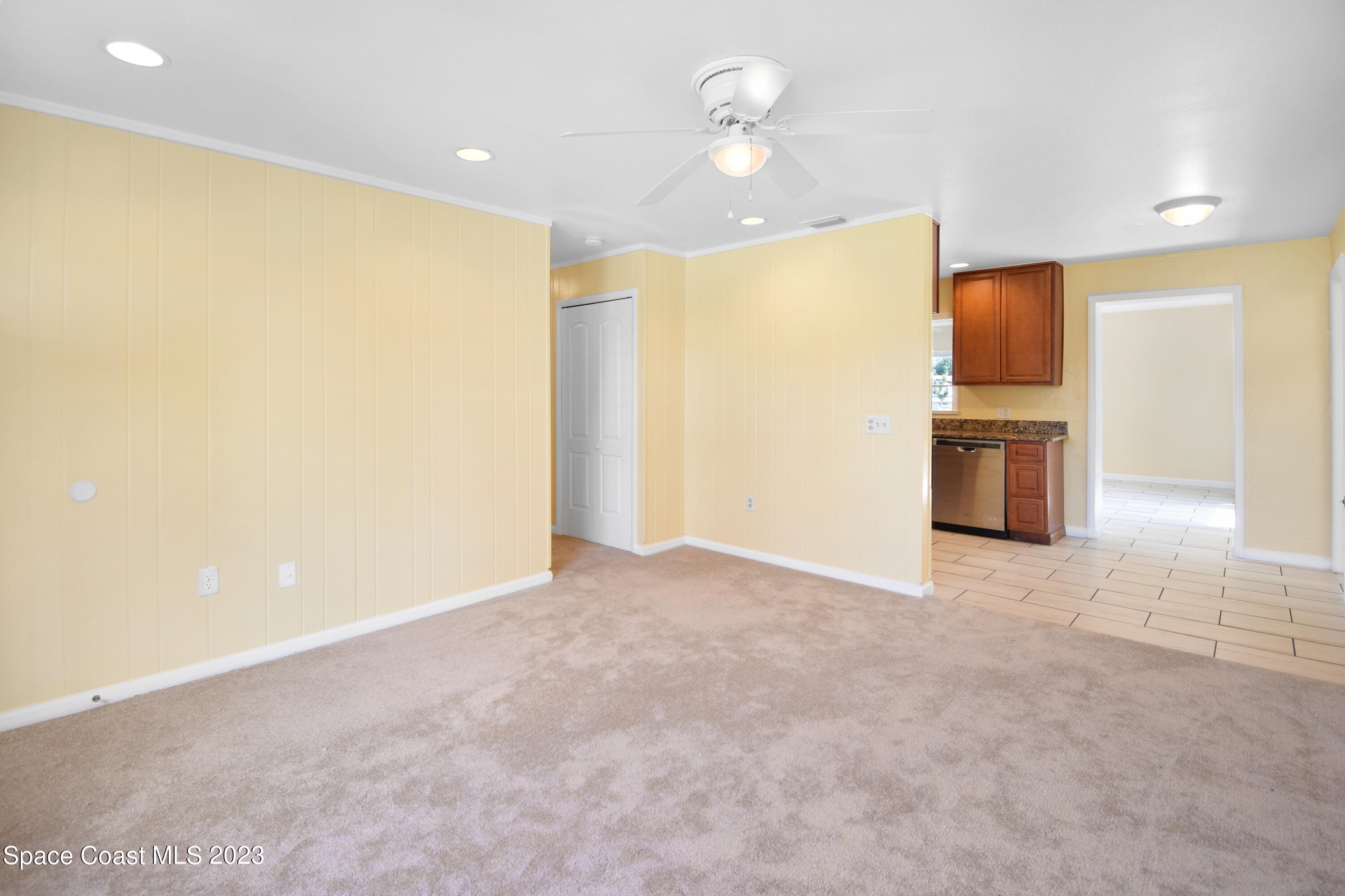2439 Delaware Drive Melbourne, FL 32935 - Photo 14 of 32 a view of an empty room with a window