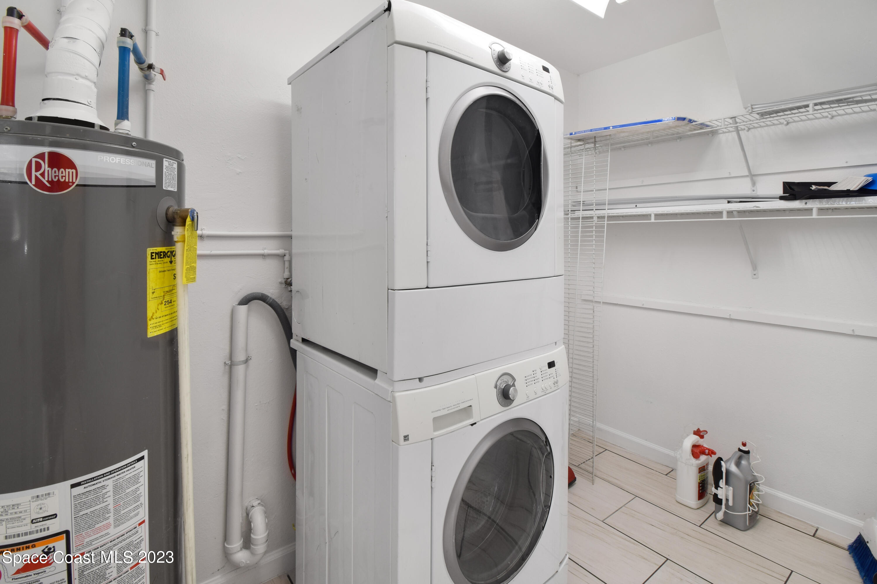 2439 Delaware Drive Melbourne, FL 32935 - Photo 22 of 32 a utility room with dryer and washer