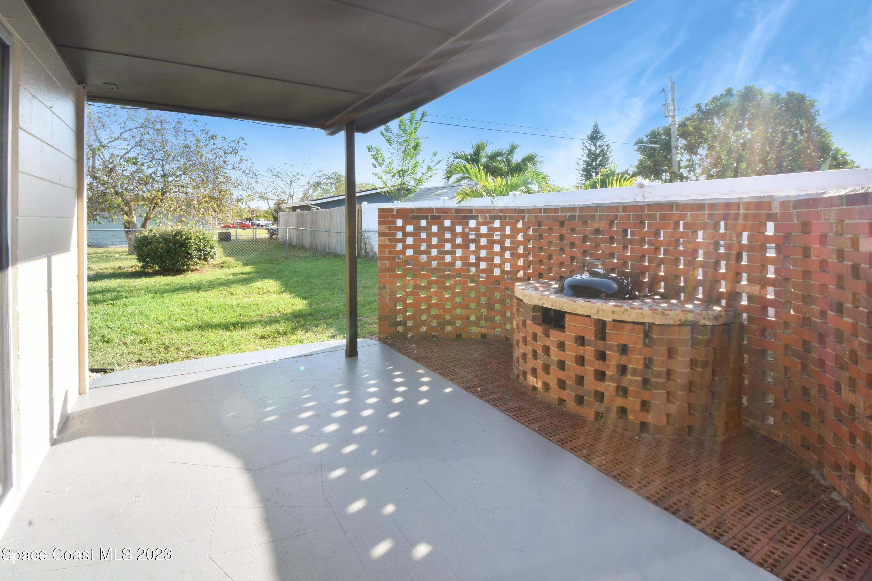 2439 Delaware Drive Melbourne, FL 32935 - Photo 23 of 32 a view of outdoor space and garden