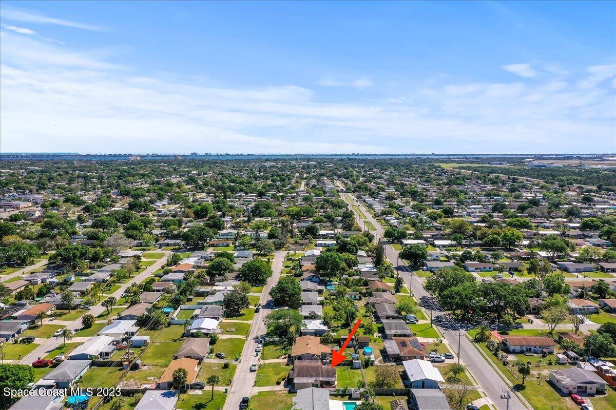 2439 Delaware Drive Melbourne, FL 32935 - Photo 29 of 32 an aerial view of multiple house