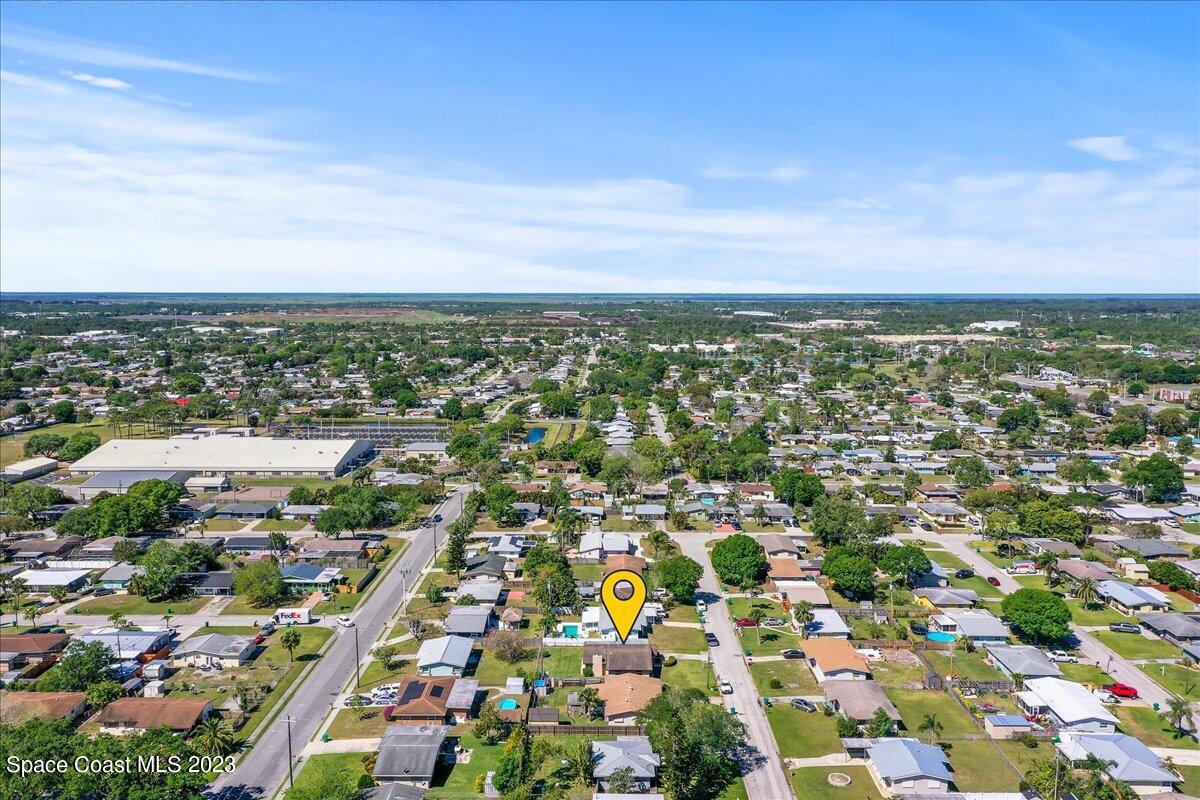 2439 Delaware Drive Melbourne, FL 32935 - Photo 30 of 32 an aerial view of multiple house