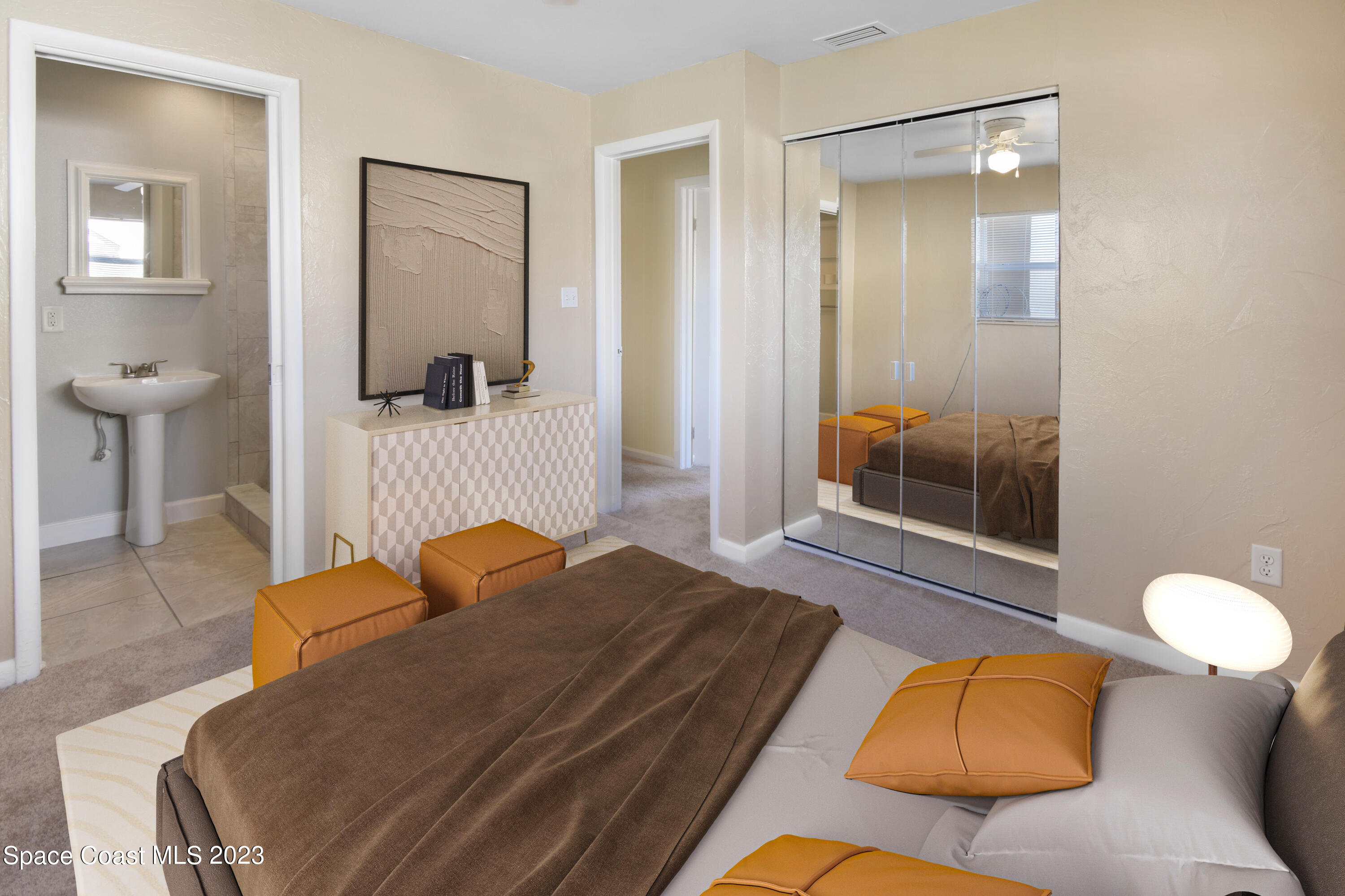 2439 Delaware Drive Melbourne, FL 32935 - Photo 6 of 32 a bedroom with a bed and window