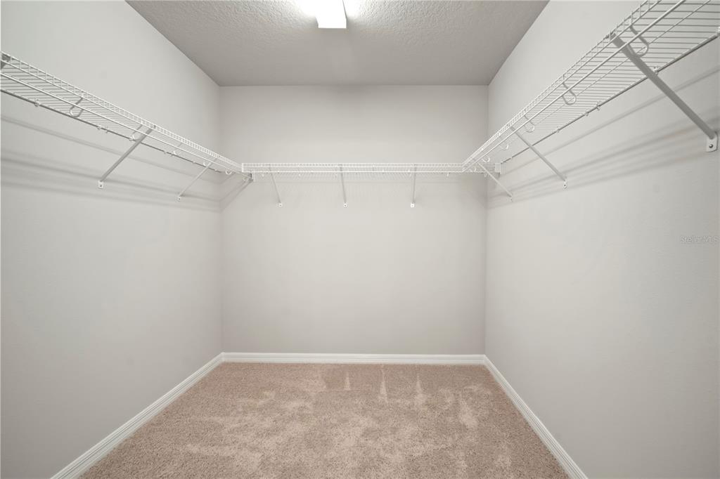 5636 Silver Sun Drive Apollo Beach, FL 33572 - Photo 42 of 61 a view of a room with racks on the wall